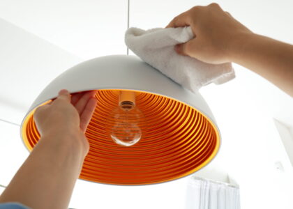 Property cleaning - chandelier dusting.